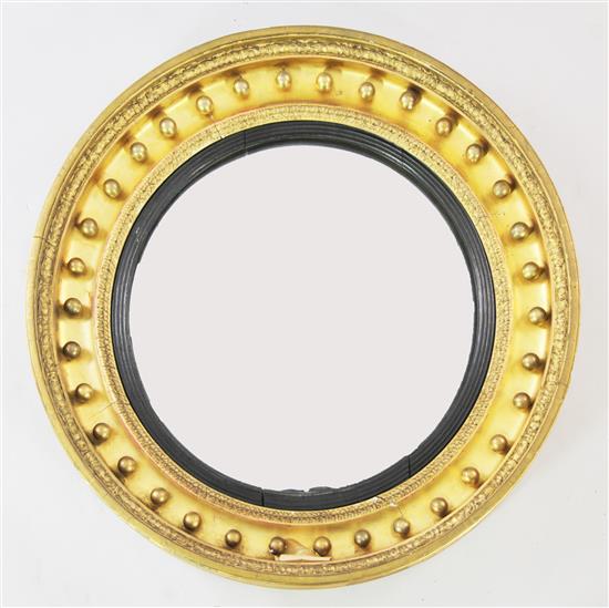 A large 19th century circular convex gilt wall mirror, W.2ft 5.5in.